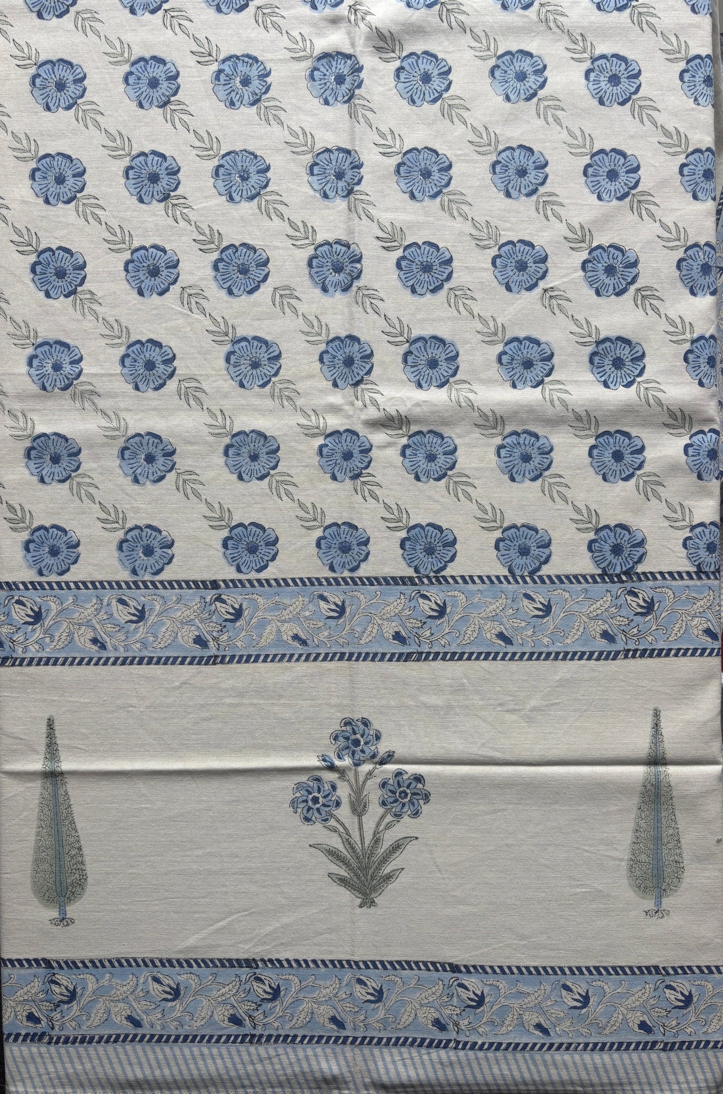 Block print table cloth with blue floral pattern