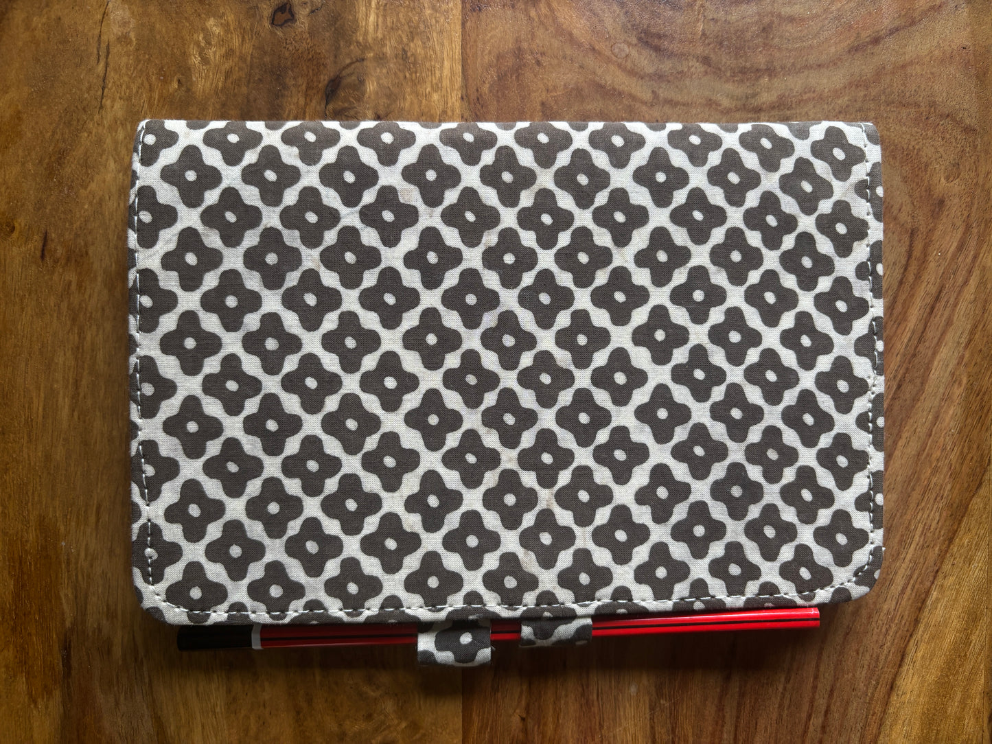 Patterned journal with pencil lock feature