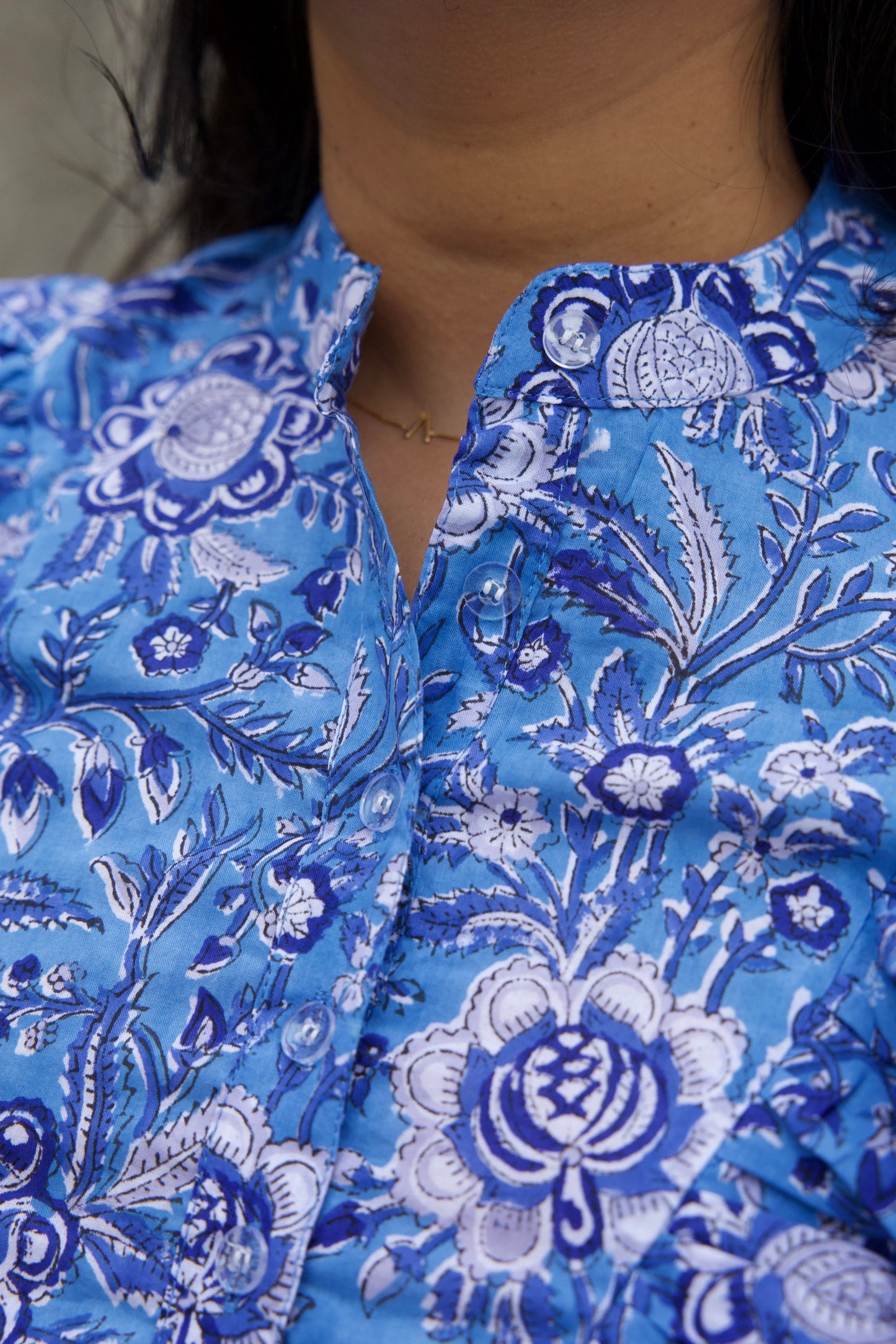 blue and white cotton sleeveless blouse
