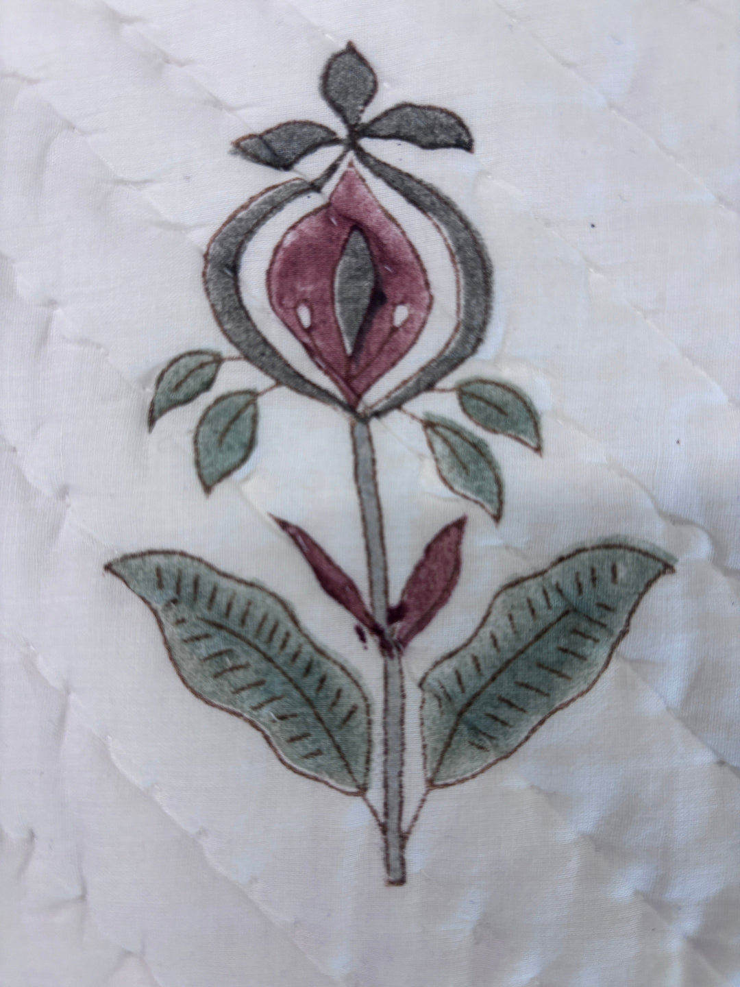 Decorative floral design on a textured white background