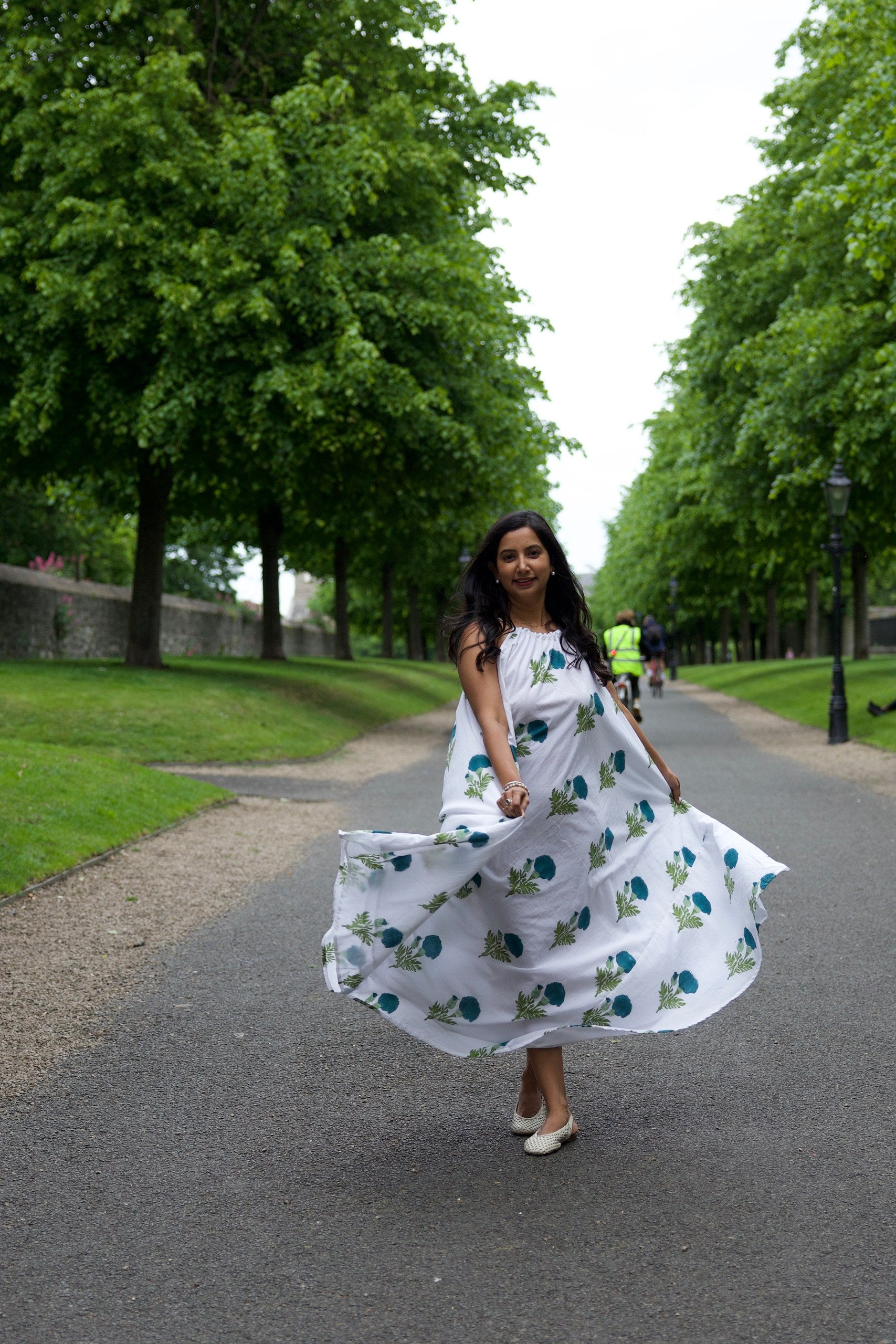 Flowy white cotton dress with dark blue block printed floral design
