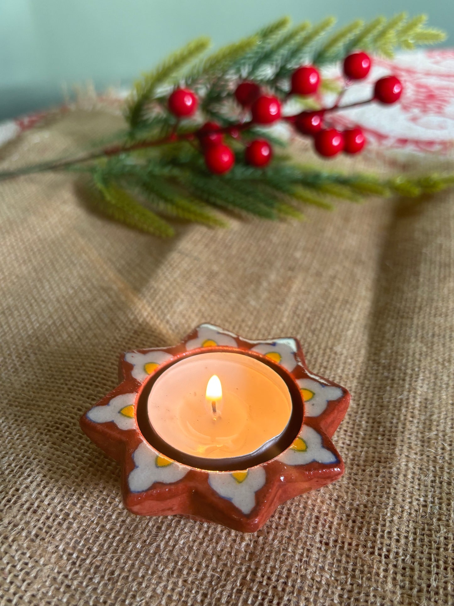 Red flower blue pottery tea light holder