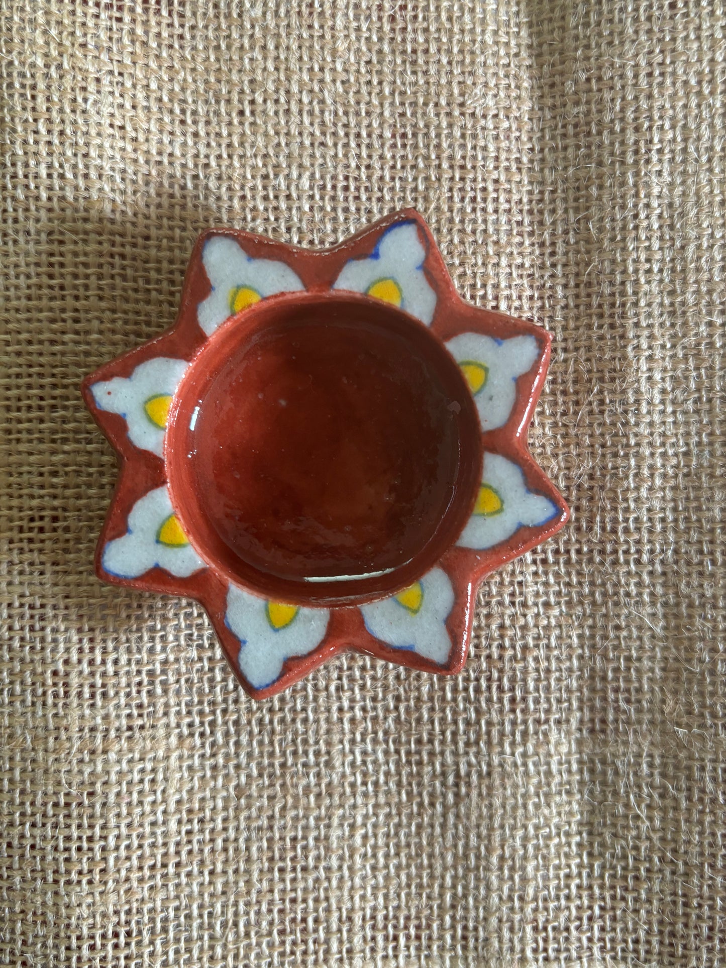 Red flower blue pottery tea light holder