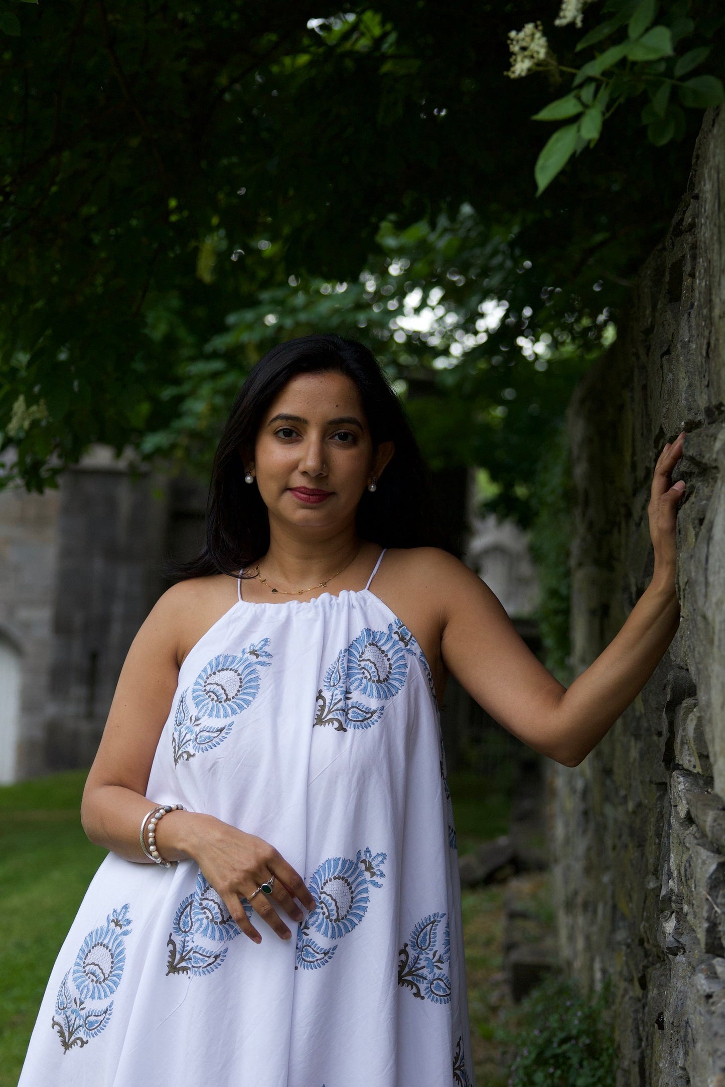 White cotton dress with blue floral motifs ideal for Beach Resort Holiday