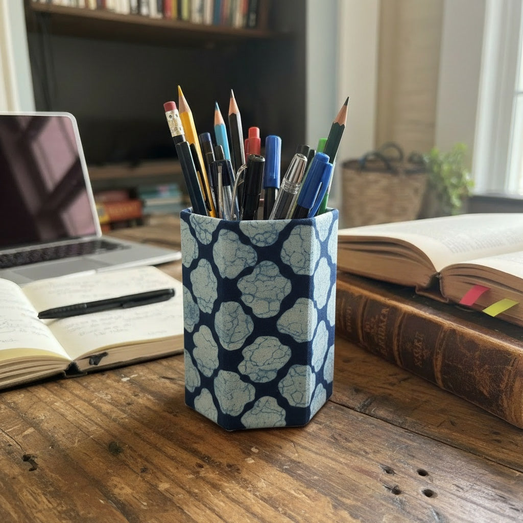 Block Printed Pen holder with pens on a desk next to books and a laptop